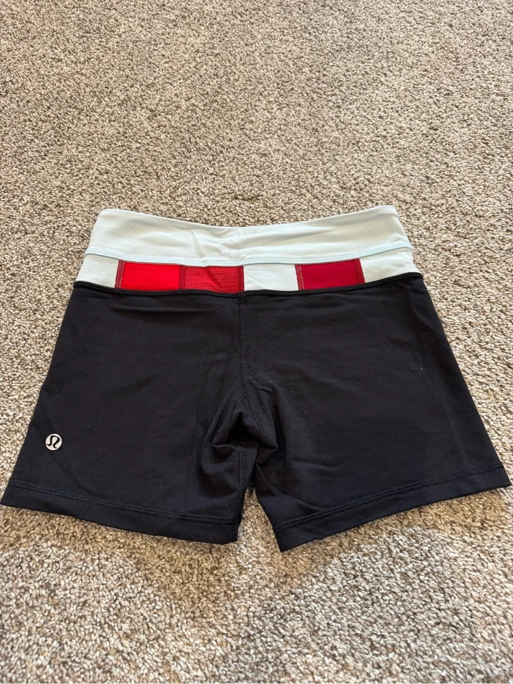 Lululemon booty Black Athletic Shorts with Red and light blue waistband